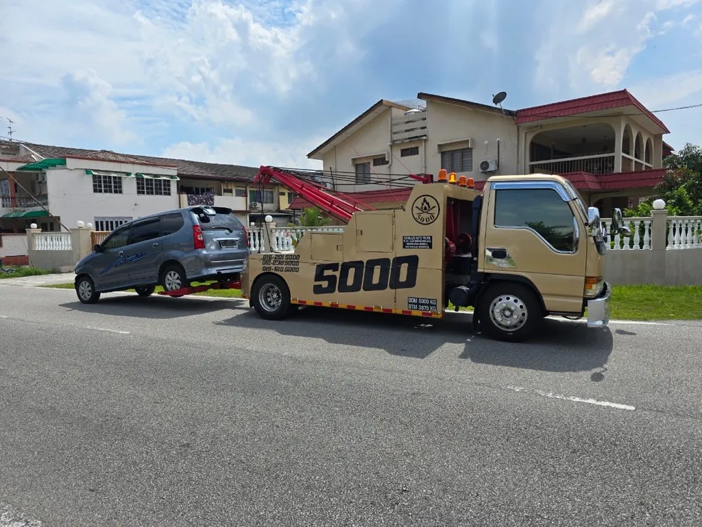 Vehicle being loaded onto car carrier