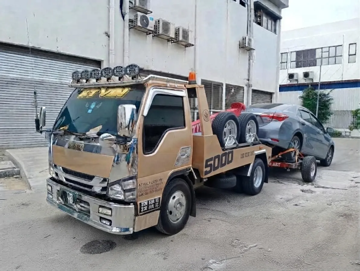 Car carrier transporting a vehicle