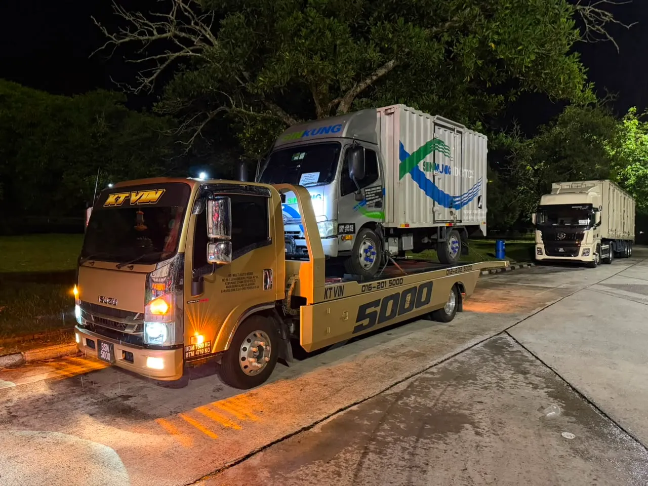 Car carrier transporting a vehicle